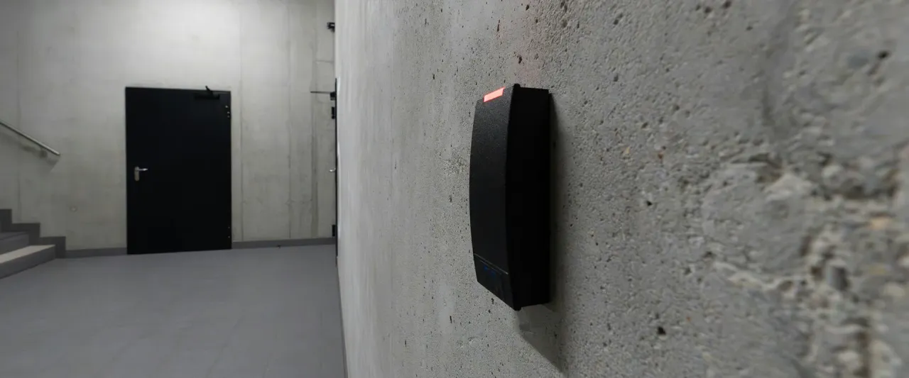 Workers using RFID badges for time and attendance tracking